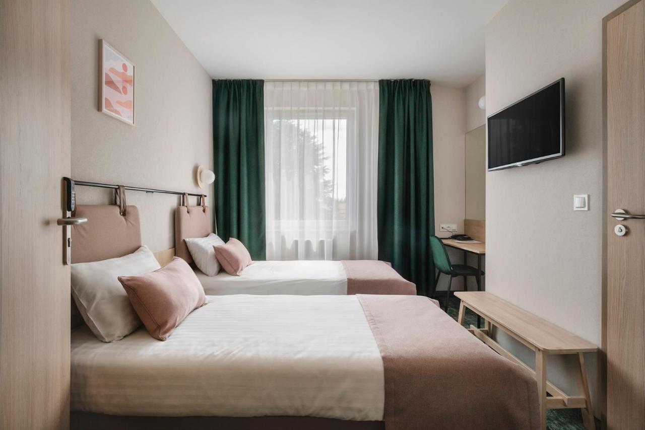 Tweepersoonskamer met 2 Aparte Bedden