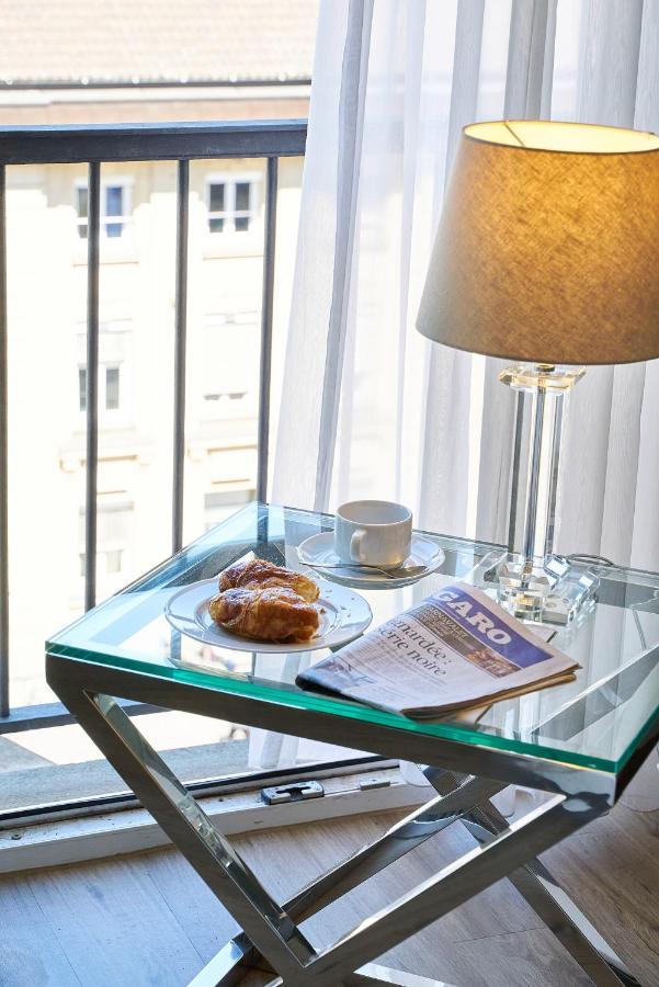 Vierbettzimmer mit kostenfreien Getränken aus der Minibar