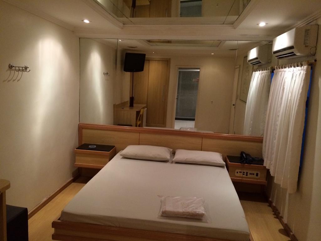 Quarto Duplo