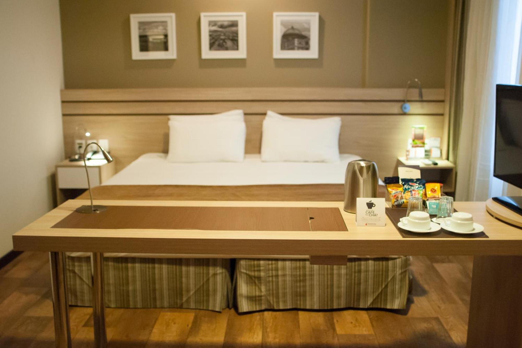 Quarto duplo superior de luxo com cama king-size