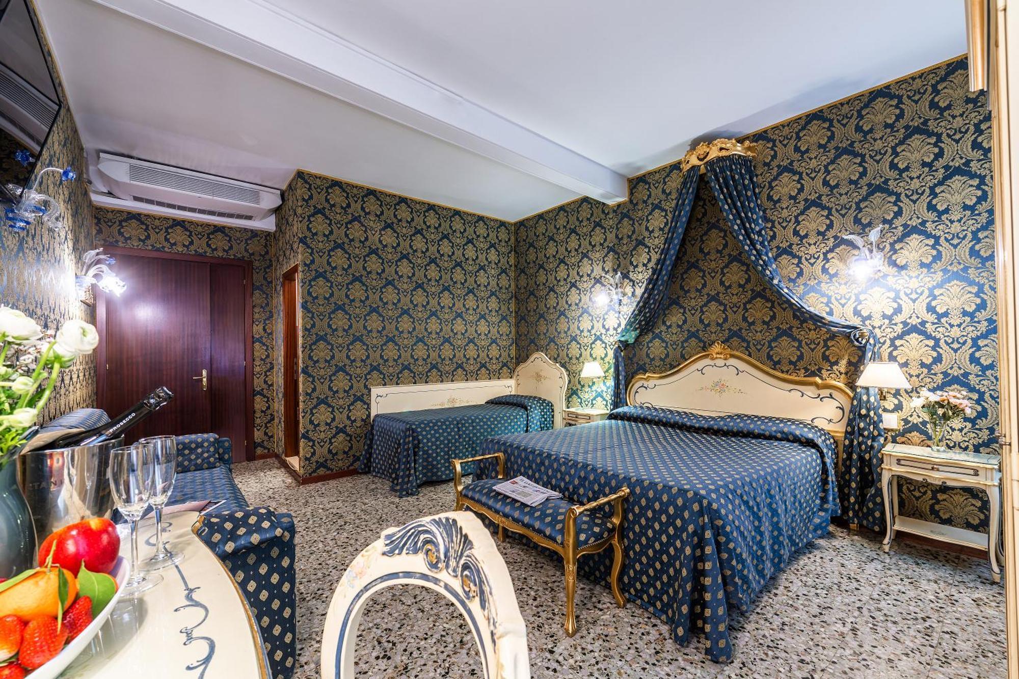 Chambre Lit Queen-Size Deluxe