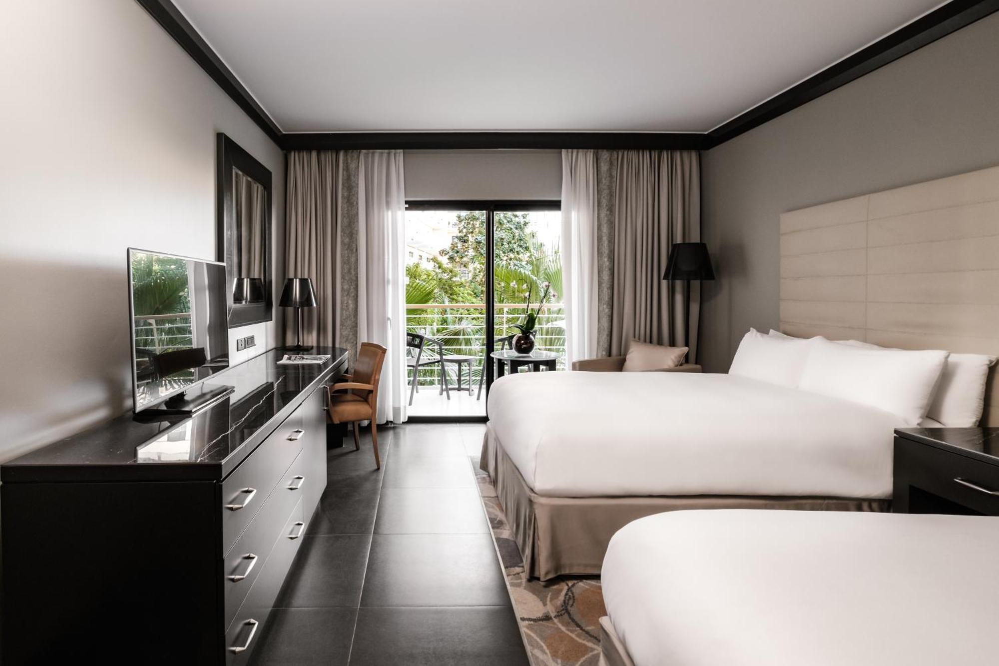 Classic Double Room with Two Double Beds and Garden View