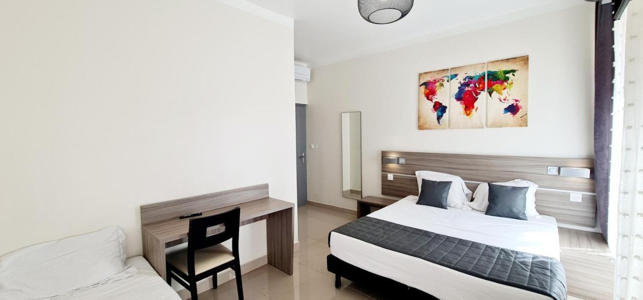 Chambre Triple avec Balcon