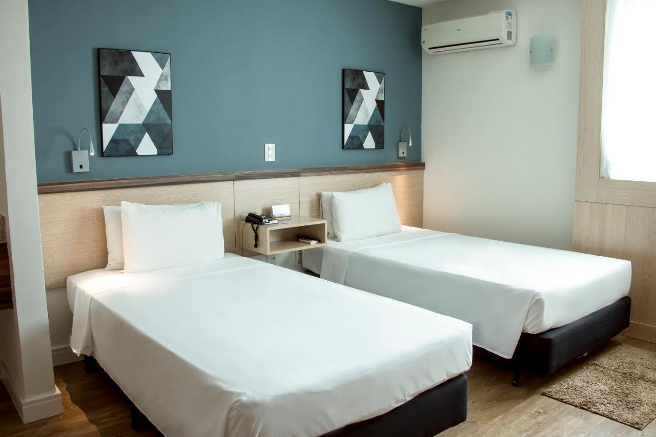 Quarto Executivo com 2 Camas de Solteiro