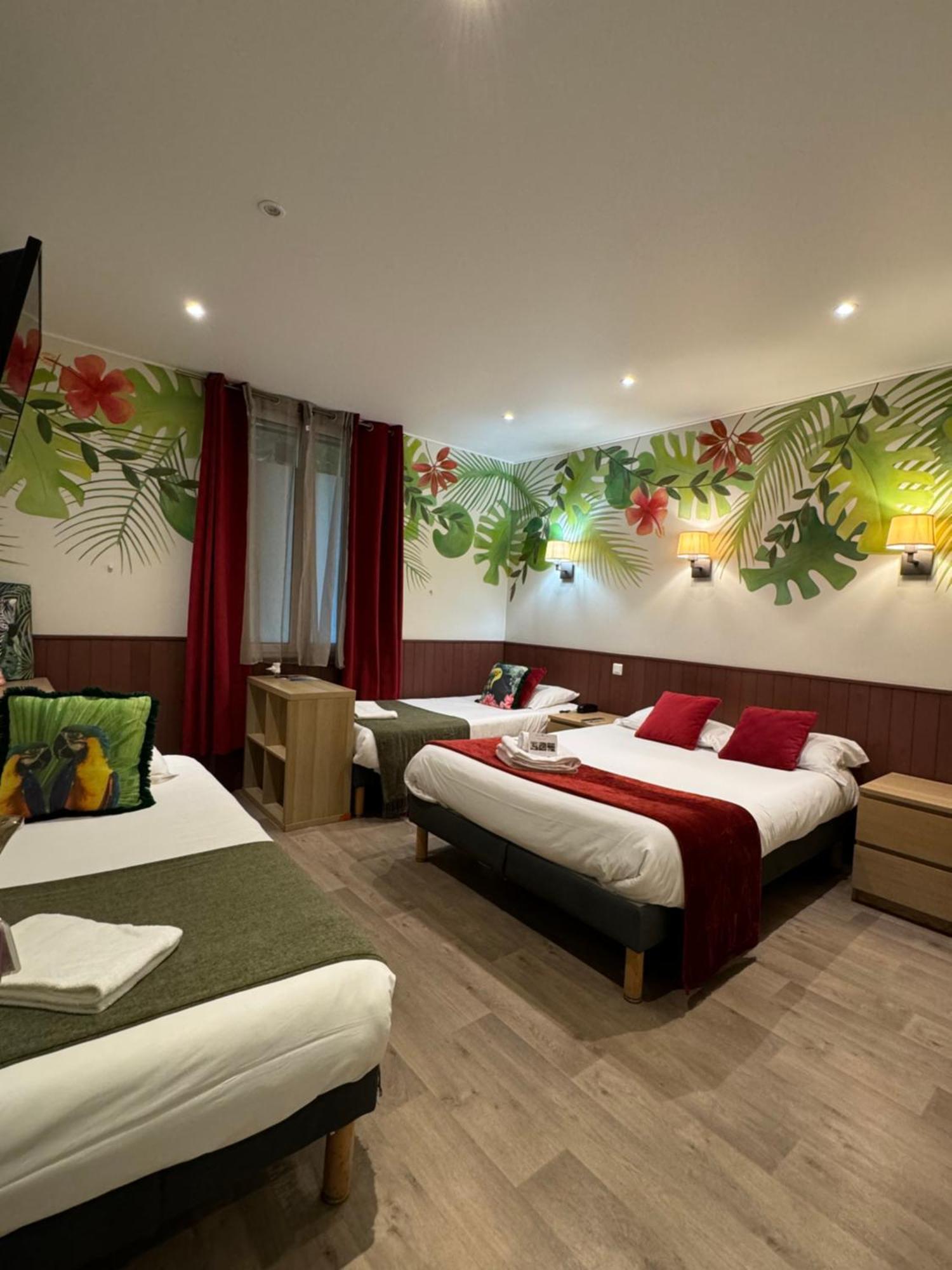 Classic Quadruple Room with window overlooking a painted wall,1525970455:JPEG