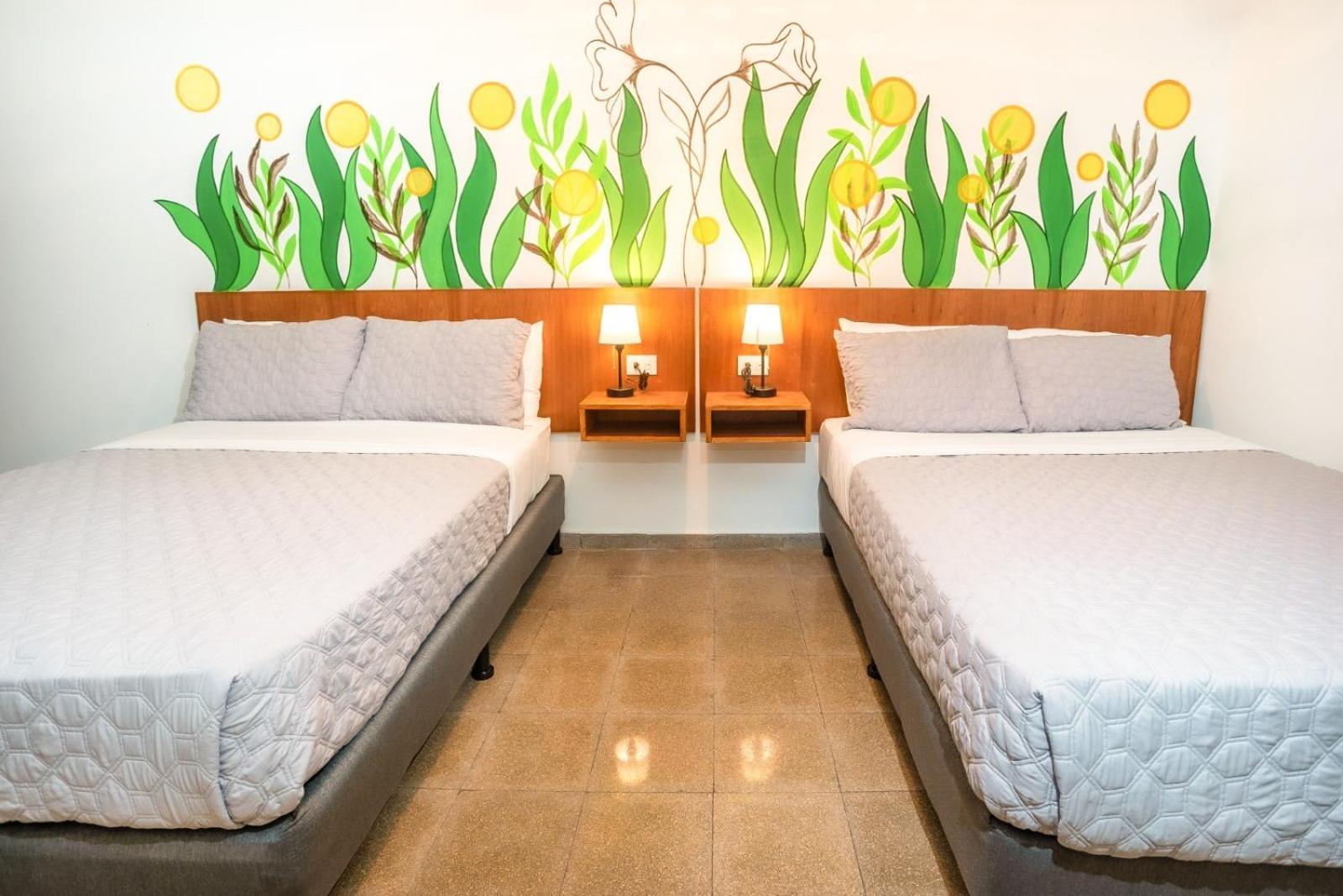 Quarto Duplo com 2 Camas de Casal