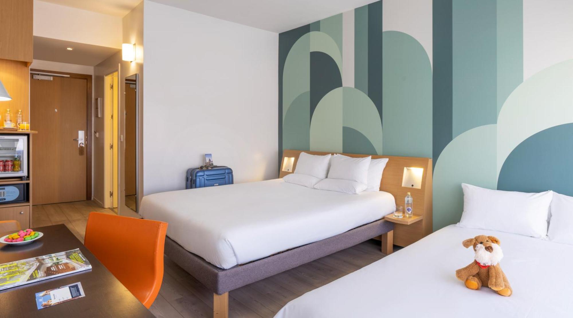 Standaard Kamer met Queensize Bed en Slaapbank - Plaza Building