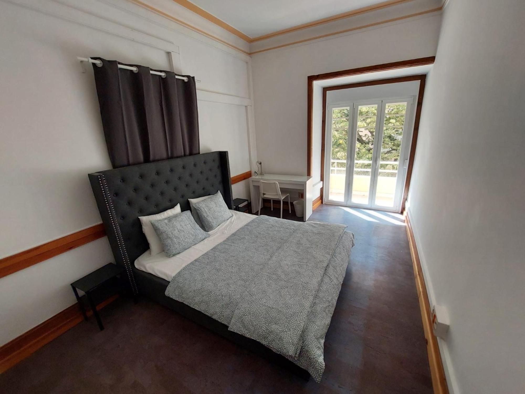 Quarto Duplo com Casa de Banho Partilhada