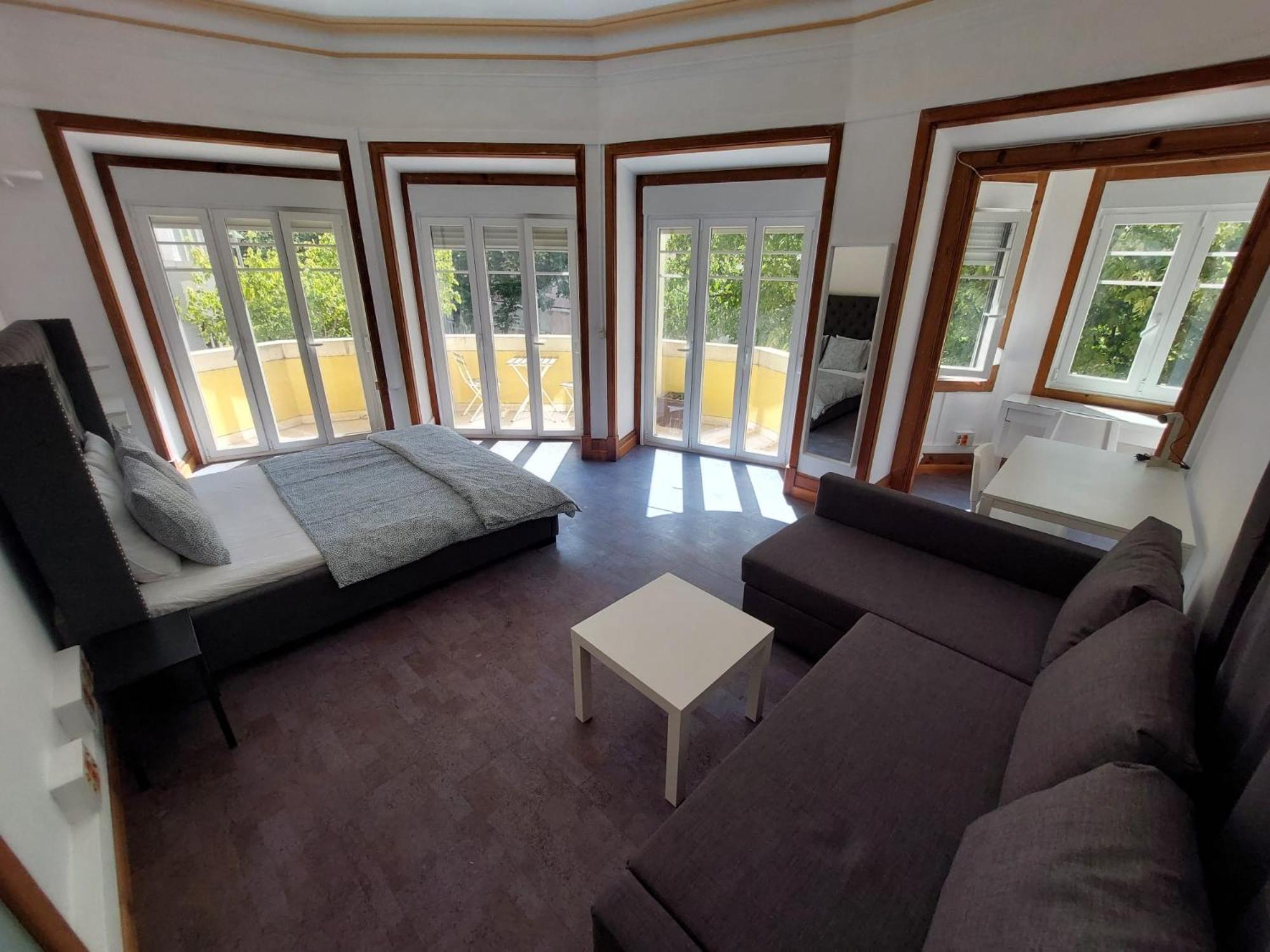 Quarto Quádruplo com Casa de Banho Partilhada