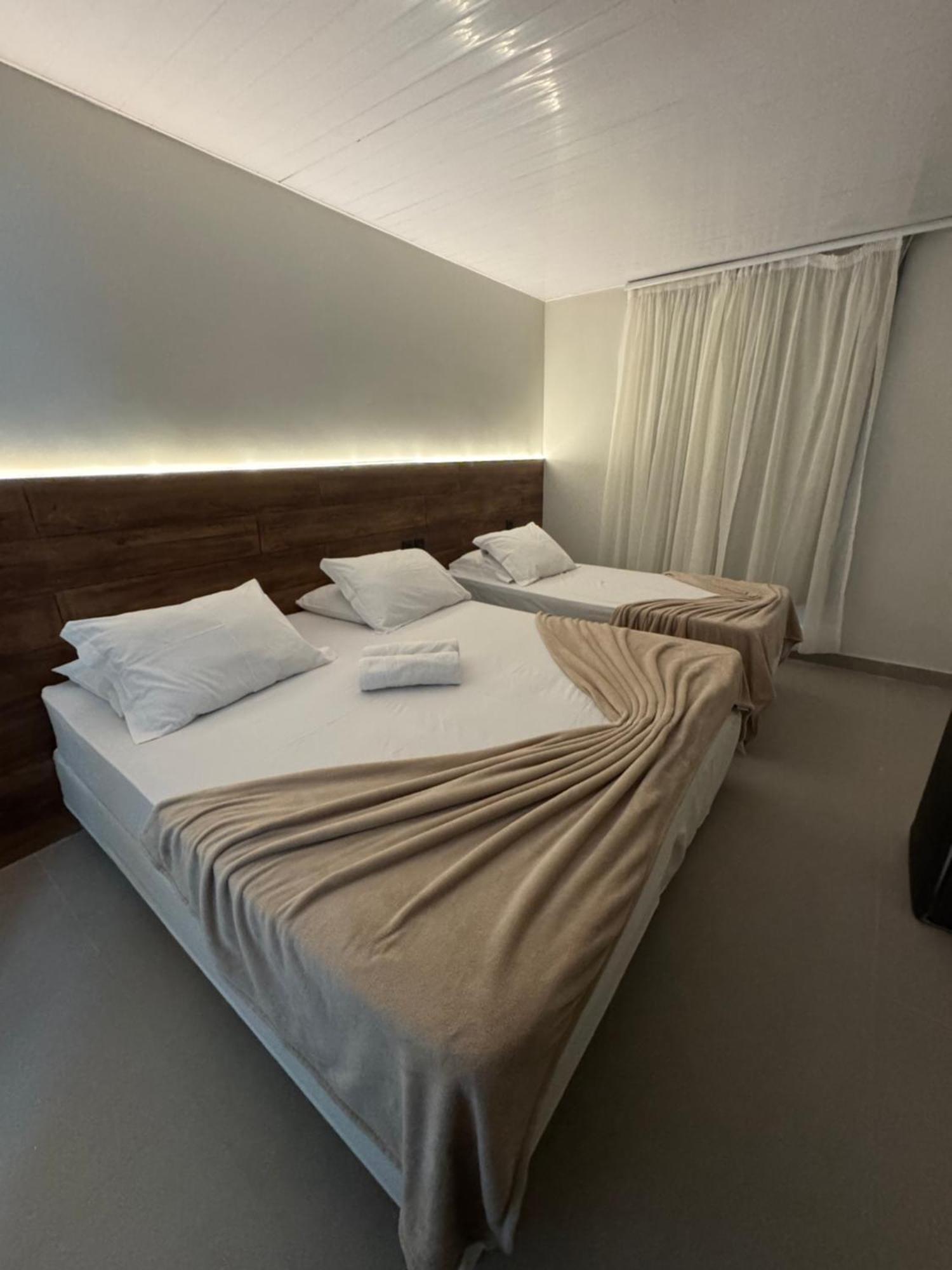 Quarto Triplo com Varanda