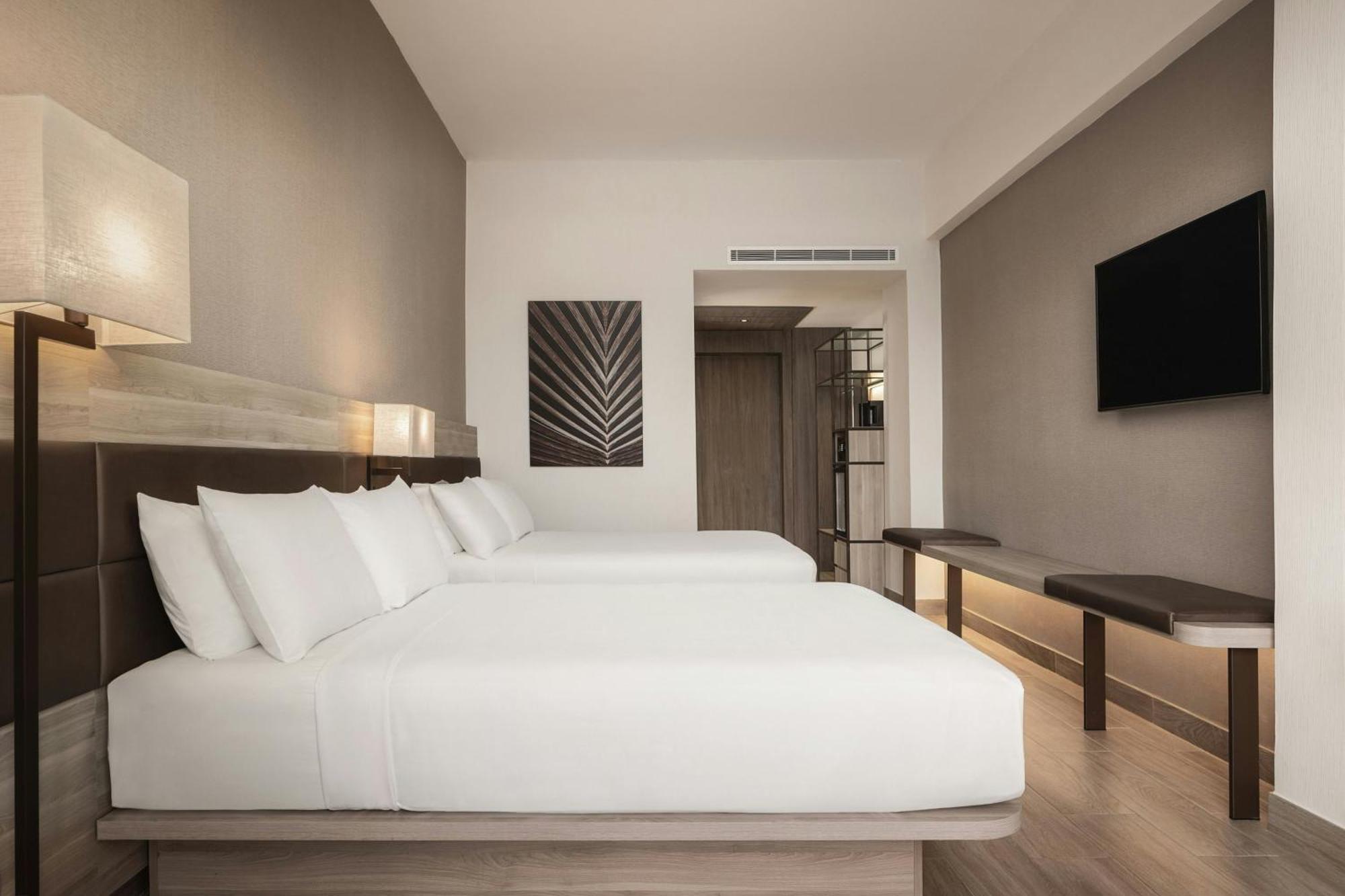 Deluxe Queen Room Two Queen Beds Pool View