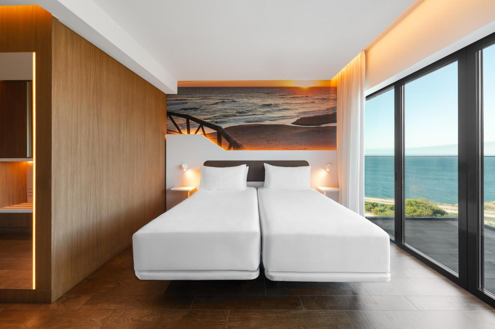 Kamer met Queensize Bed of 2 Aparte Bedden en Balkon - Uitzicht op Zee