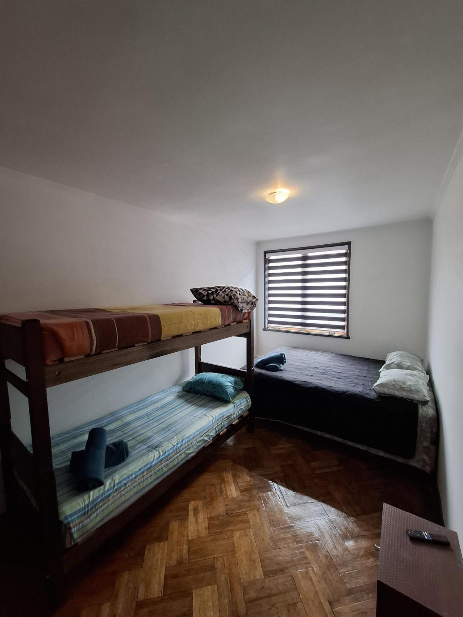 Quarto Quádruplo com Banheiro Compartilhado