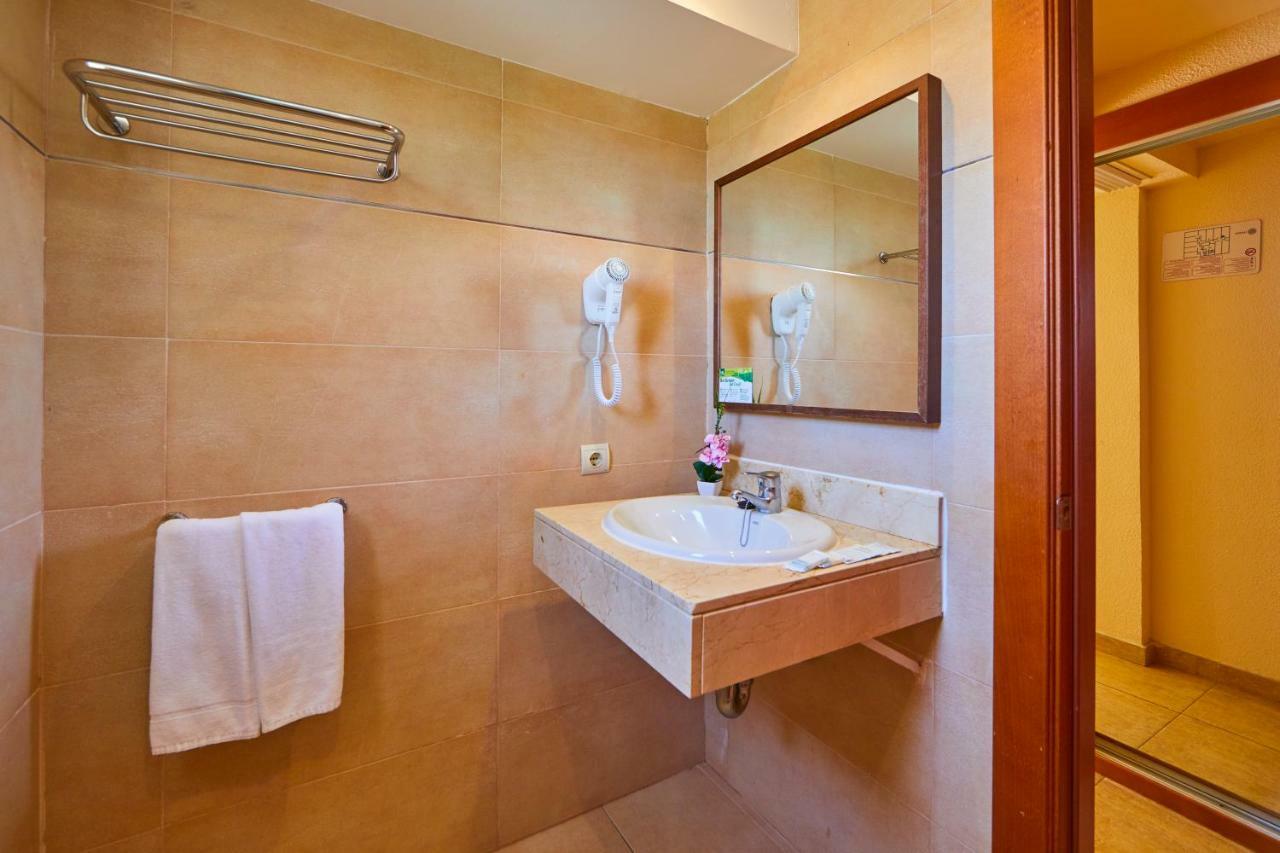 Habitación Doble (2 adultos + 1 niño)