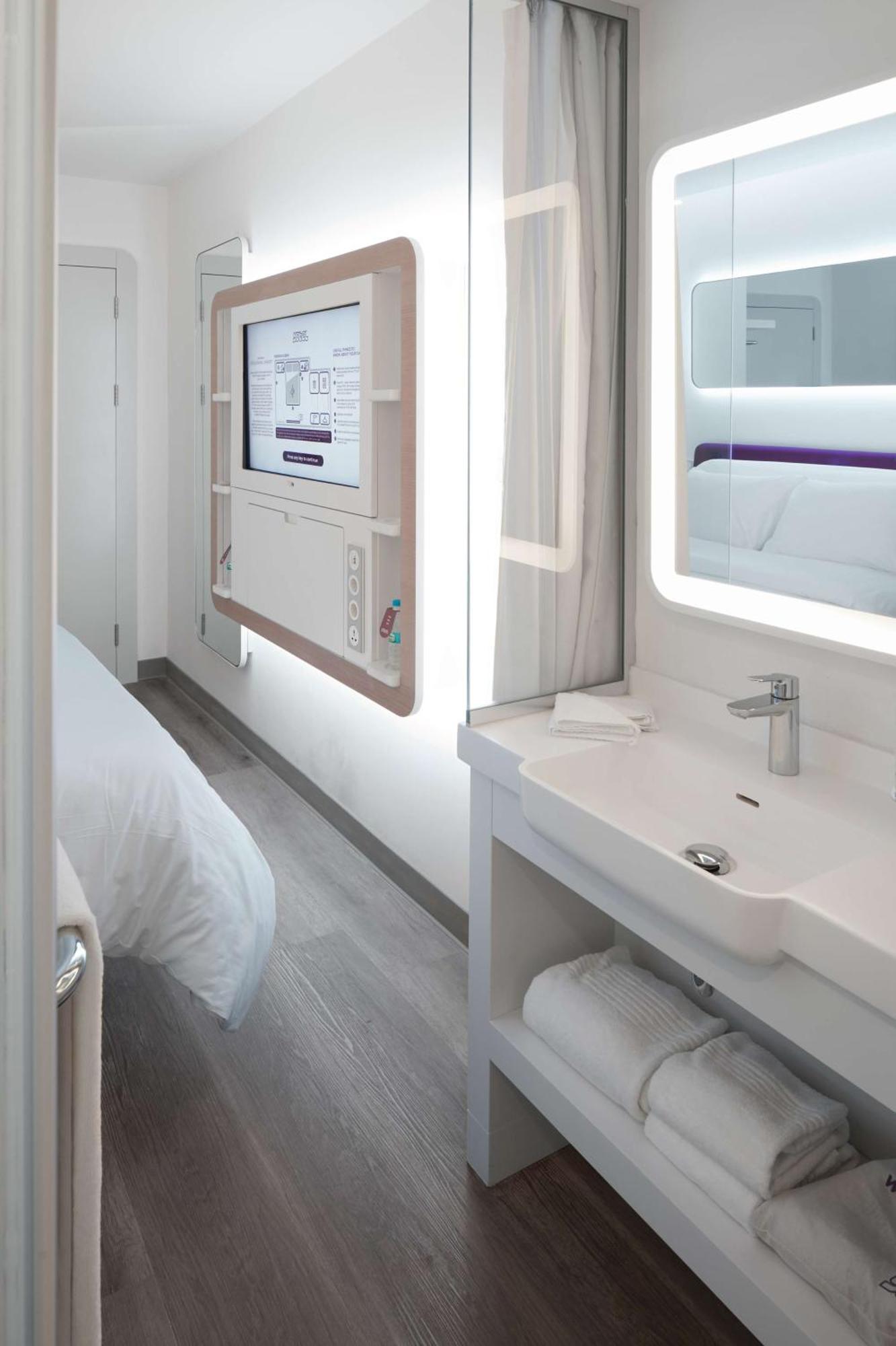 Hébergement Lit Queen-Size Premium