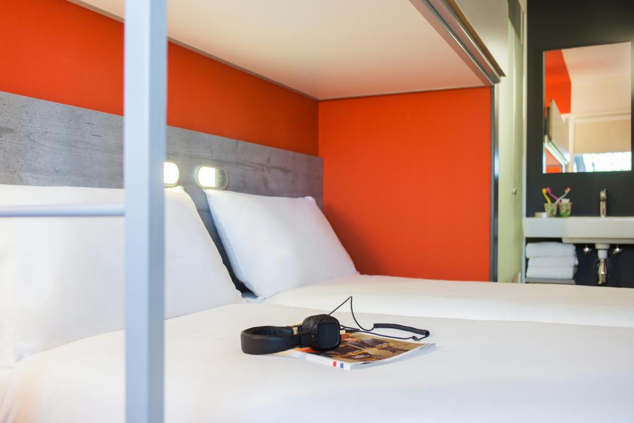 Standaard Kamer met 2 Eenpersoonsbedden en 1 Stapelbed
