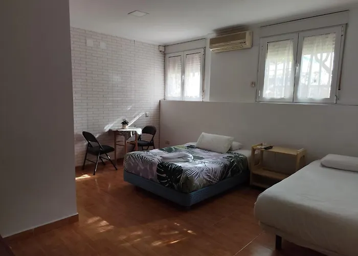 Y Habitaciones El Colmenar